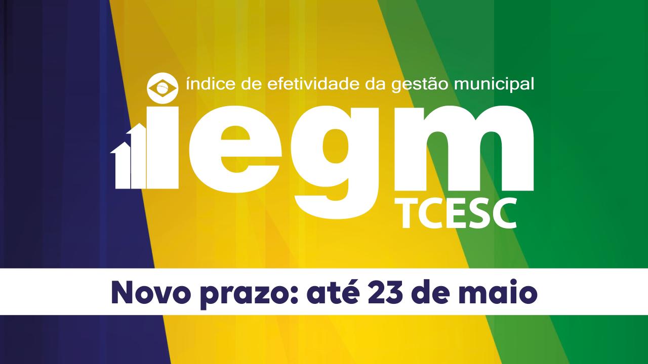 Banner horizontal com fundo nas cores verde, amarela e azul. Ao centro, em tarja branca com transparência, logo do IEGM, composto pela sigla, pelo nome por extenso, Índice de Efetividade da Gestão Municipal, e pela sigla TCE/SC, nas cores azul e verde. A letra i simula um gráfico de barras. Na parte inferior e sobre fundo branco, o texto “Novo prazo: até 23 de maio”. 