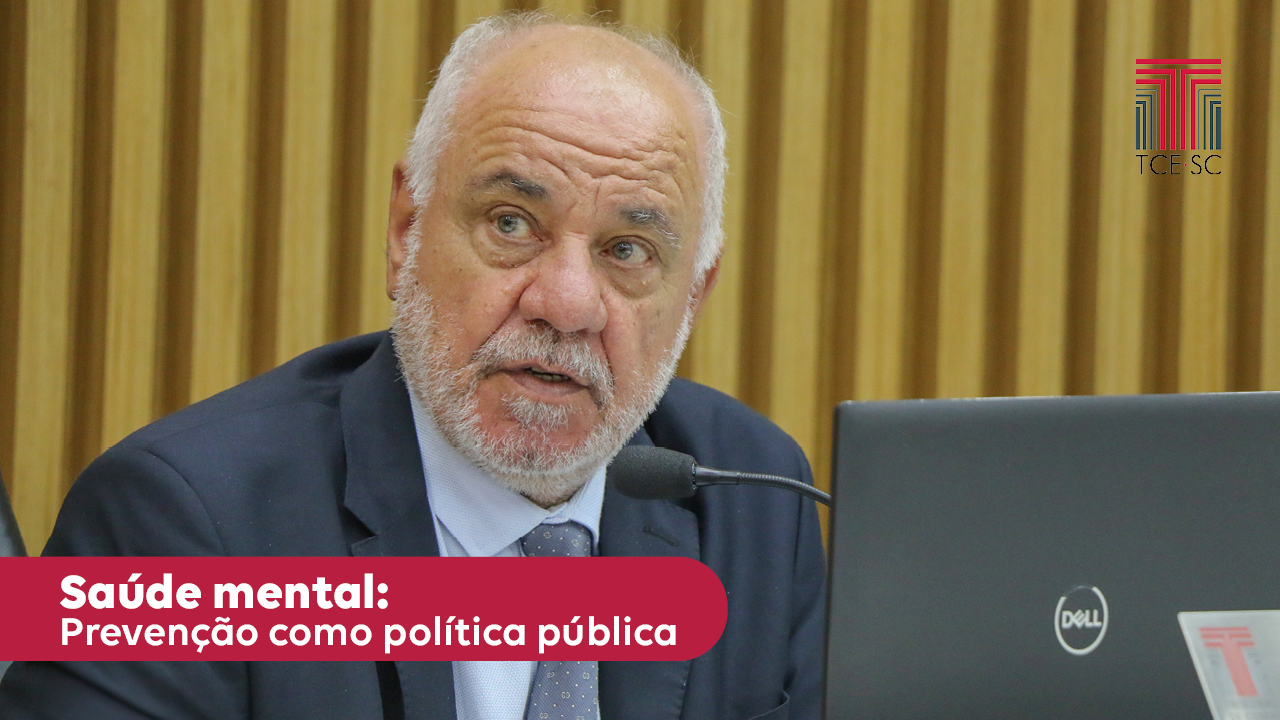 Foto do conselheiro Dado Cherem - homem branco, de cabelos grisalhos.ele veste terno cinza escuro, camisa azul calara e gravata cinza de bolinhas brancas. No canto inferior esquerdo, sobre uma tarja vermelha está escrito em letras brancas "Saúde mental: prevenção como política política"