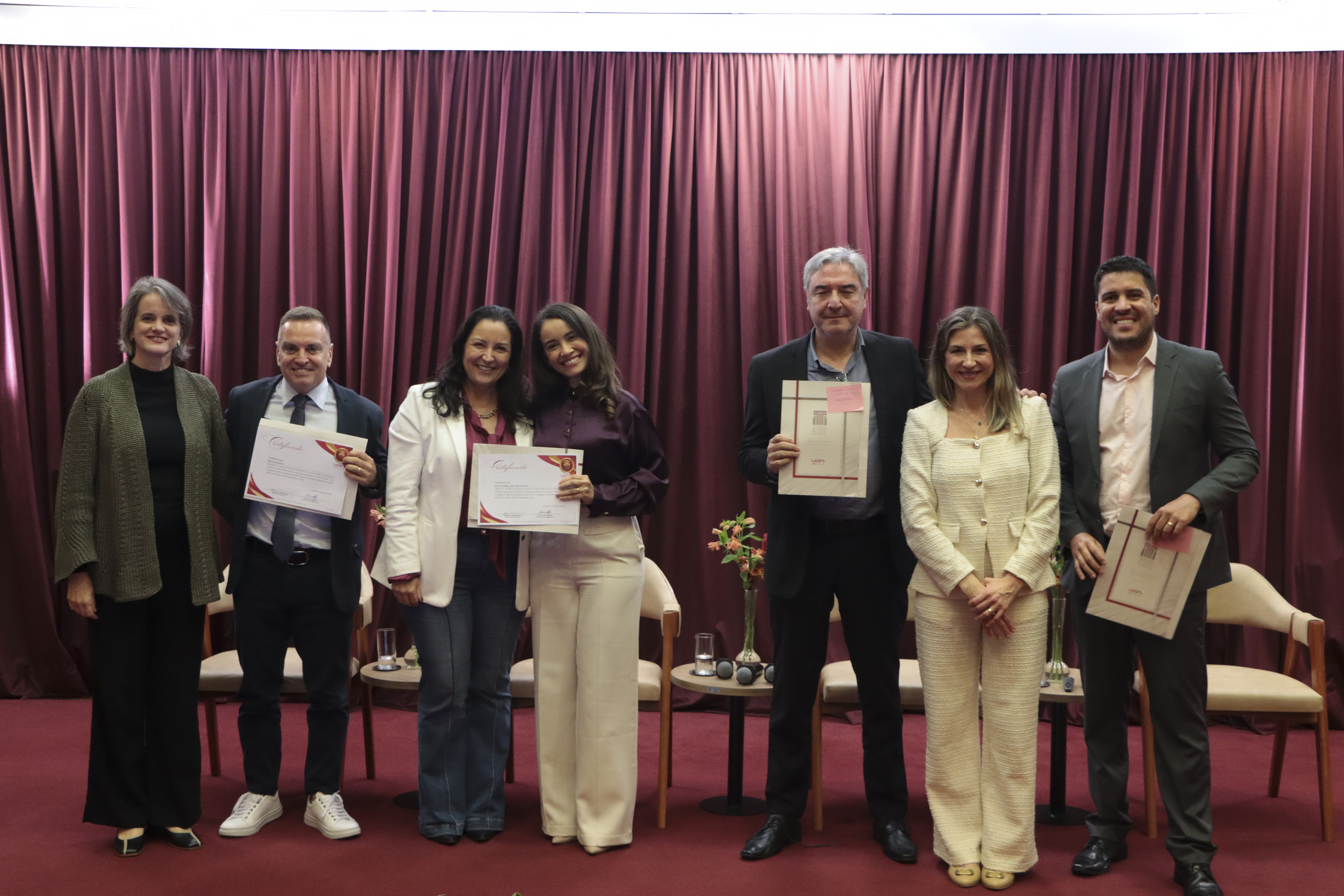 Foto dos integrantes da primeira mesa da Mostra de Pesquisa.